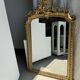 Large gilded mirror with acanthus leaf pediment H150 L98