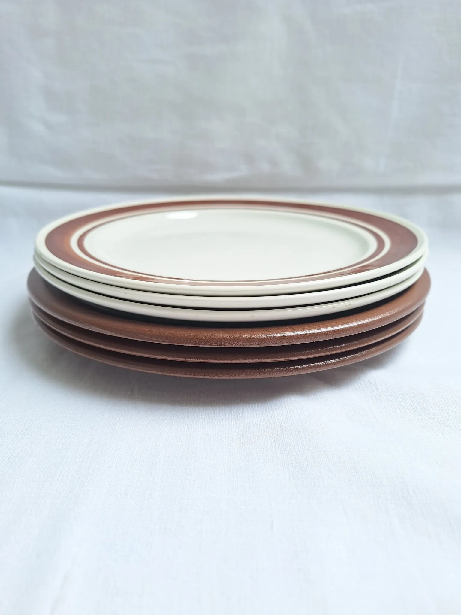 Brown flower-patterned plates from the 1970s.