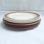 Brown flower-patterned plates from the 1970s.