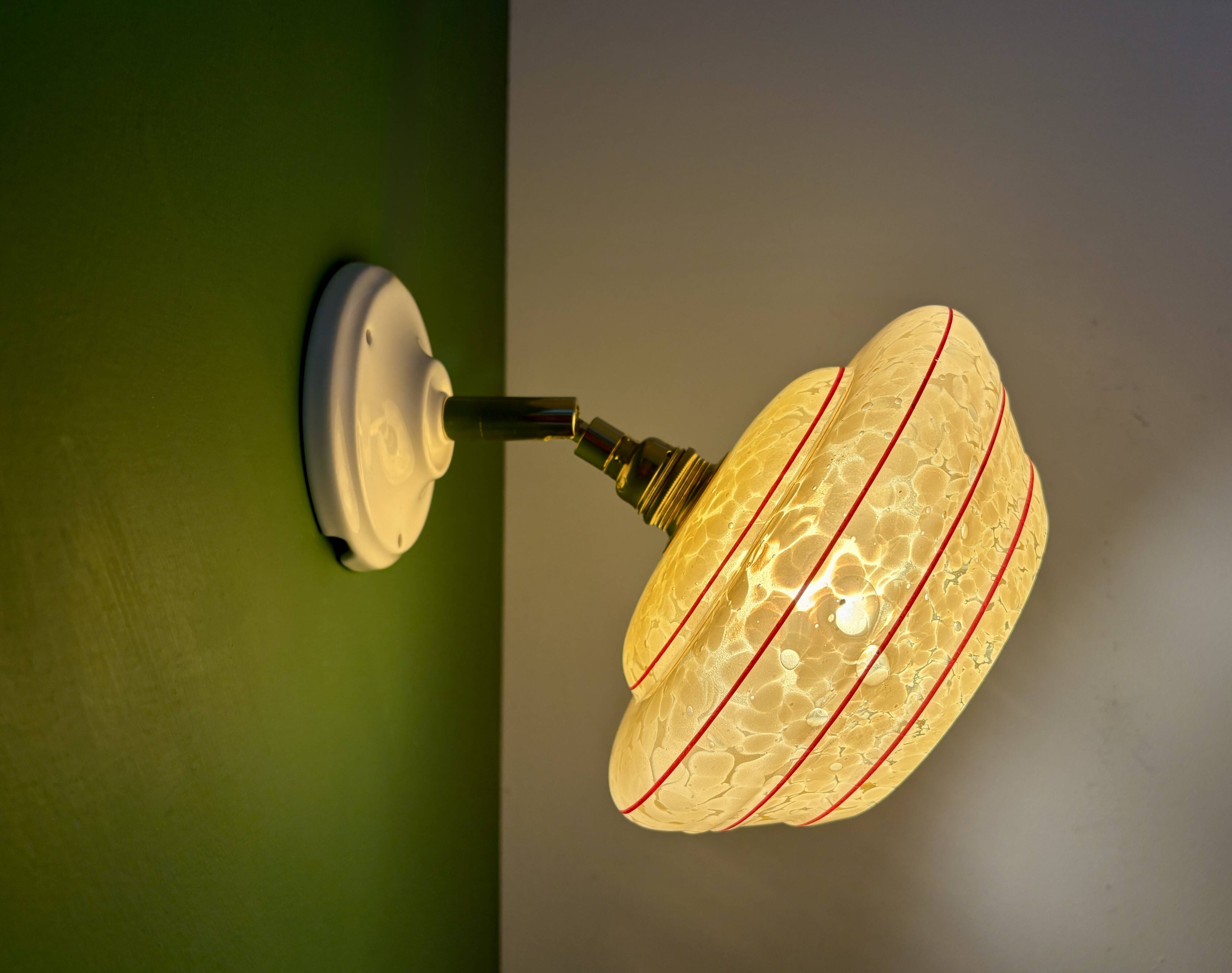 Vintage wall lamp with yellow clichy glass shade and red trim