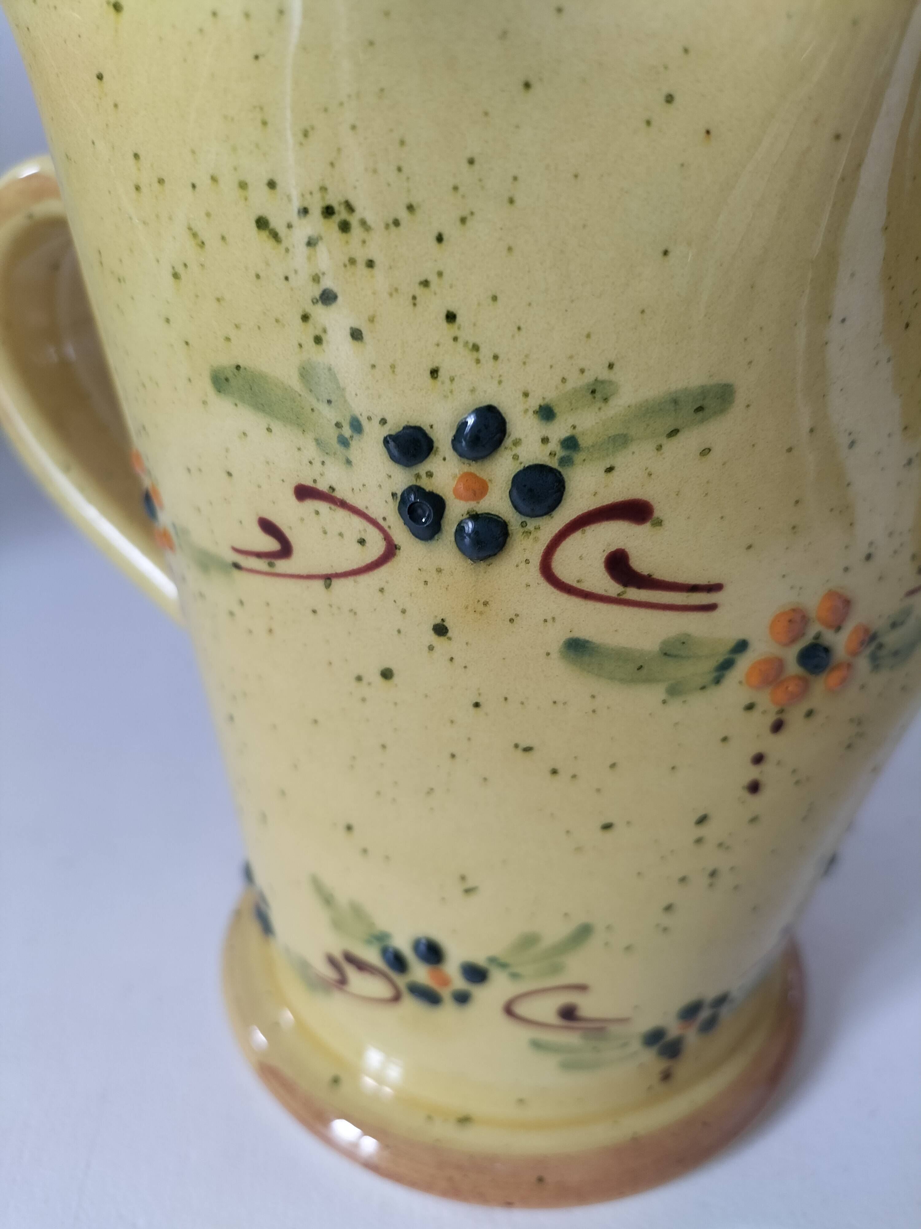 JP Daniel handmade earthenware pitcher – floral decoration on a yellow background