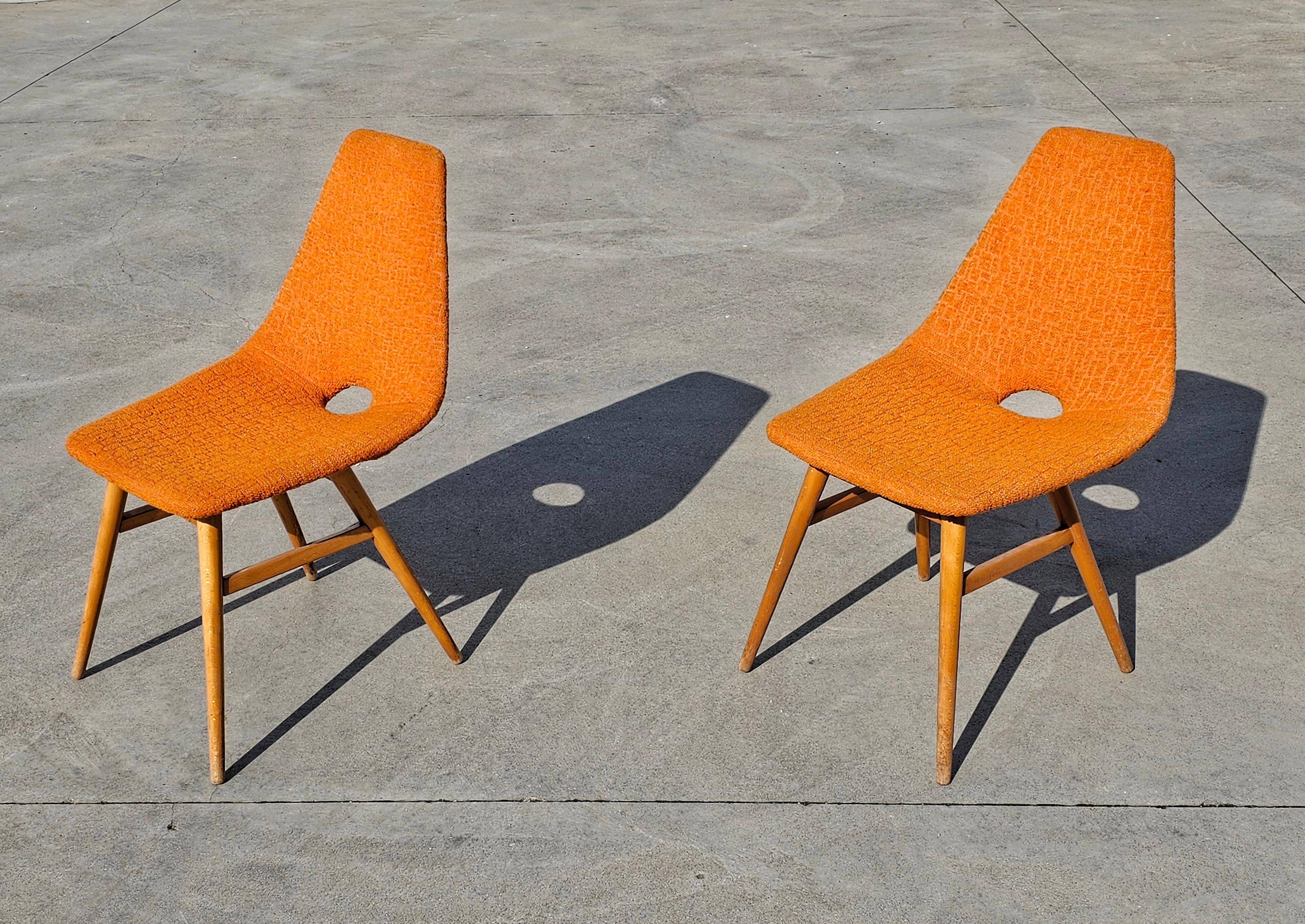 Pair of Mid-Century Modern accent chairs by Judit Burian and Erika Szek.