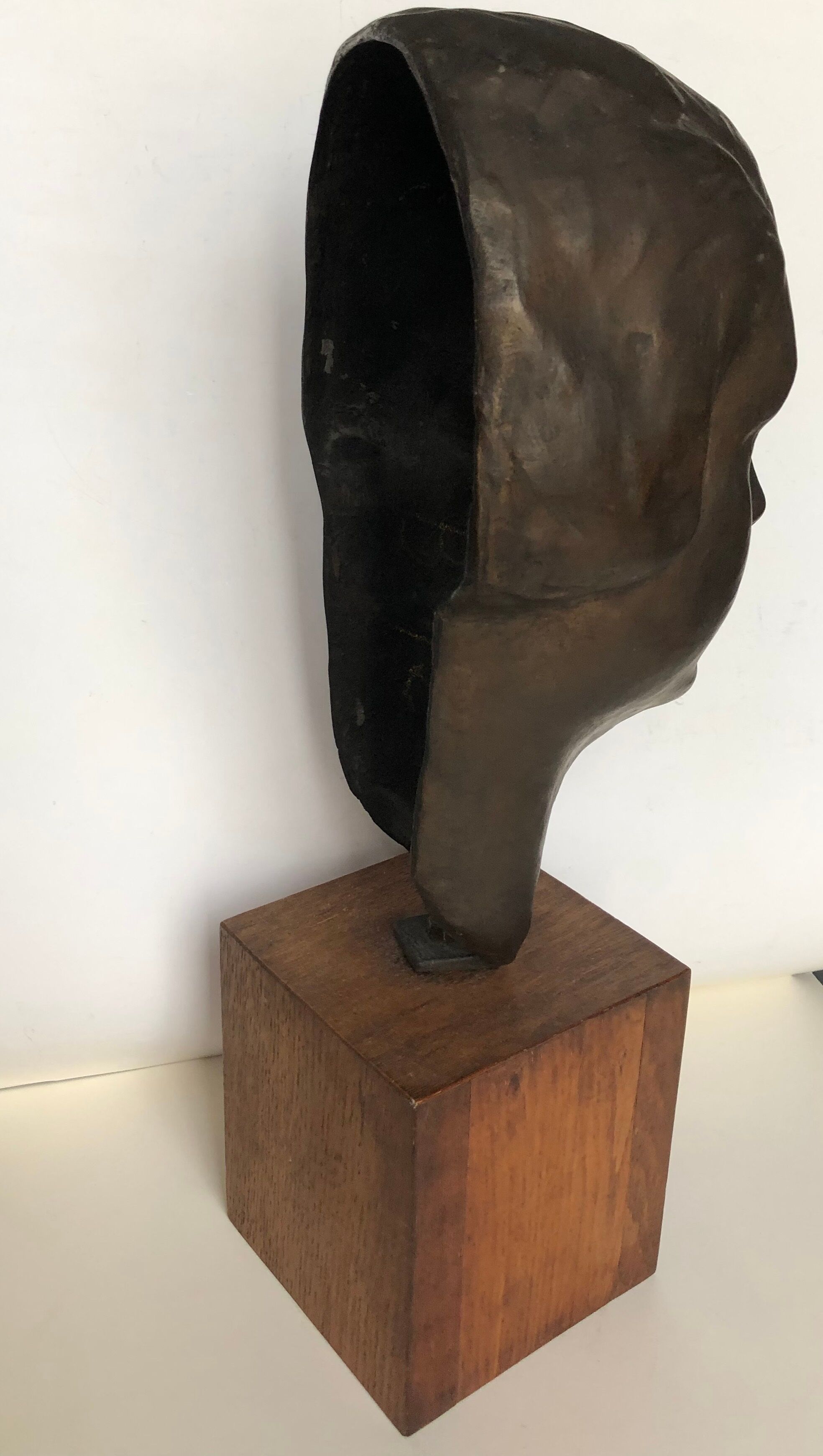 Bronze young woman's head