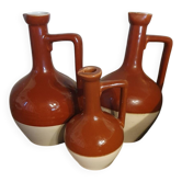 Three glazed stoneware carafes Bardinet distiller Bordeaux