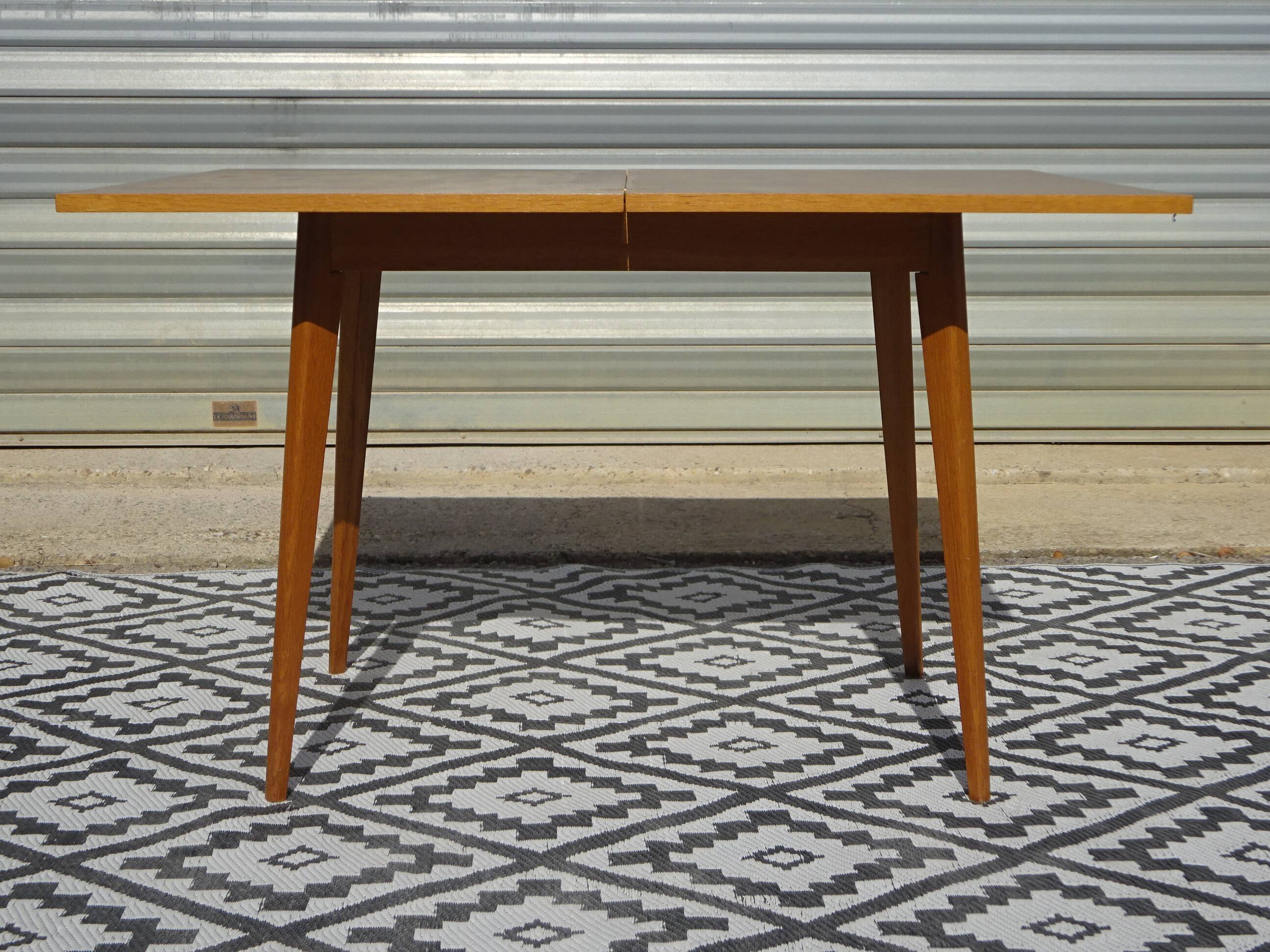 Scandinavian portfolio table model "half-century" by SAM