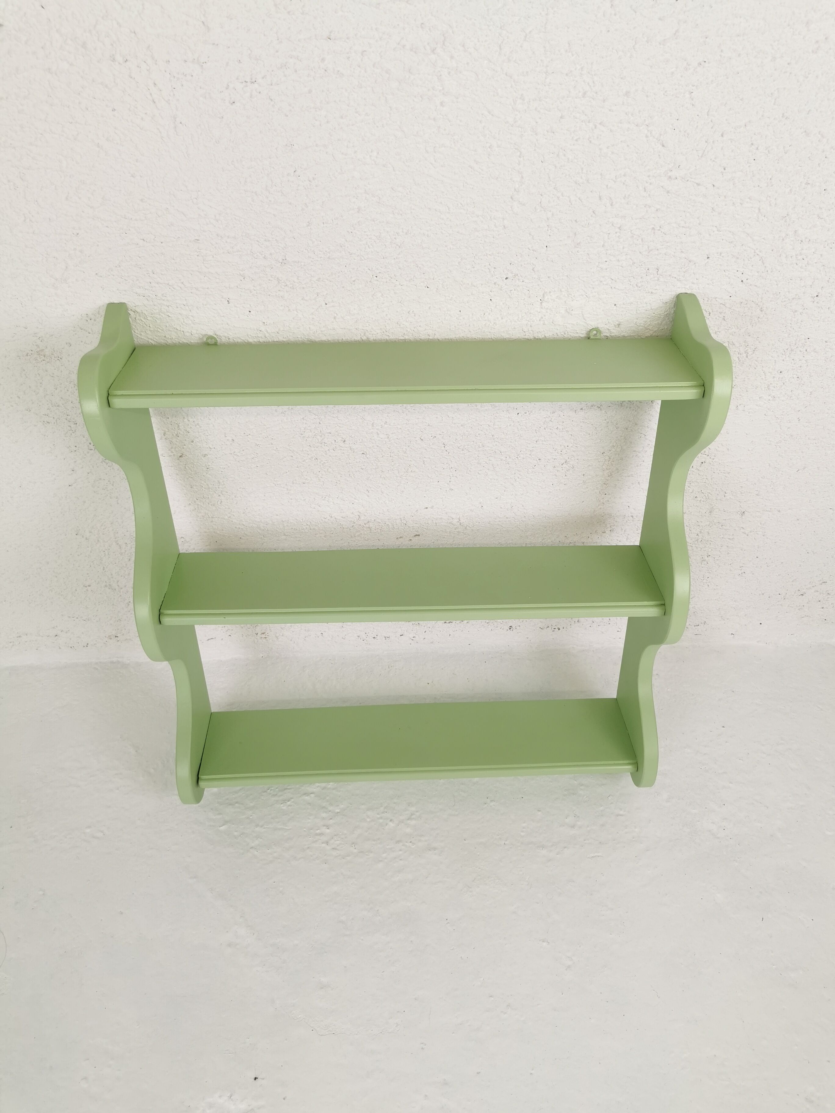 Corrugated wall shelf