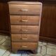 Vintage weekly chest of drawers with compass feet