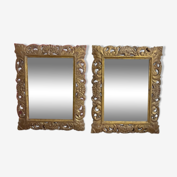 2 miroirs rectangulaires en bois sculptés, patine dorée