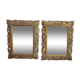2 miroirs rectangulaires en bois sculptés, patine dorée