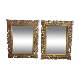 2 miroirs rectangulaires en bois sculptés, patine dorée