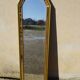 Hall mirror, gilded frame with fillets and fleur-de-lis.