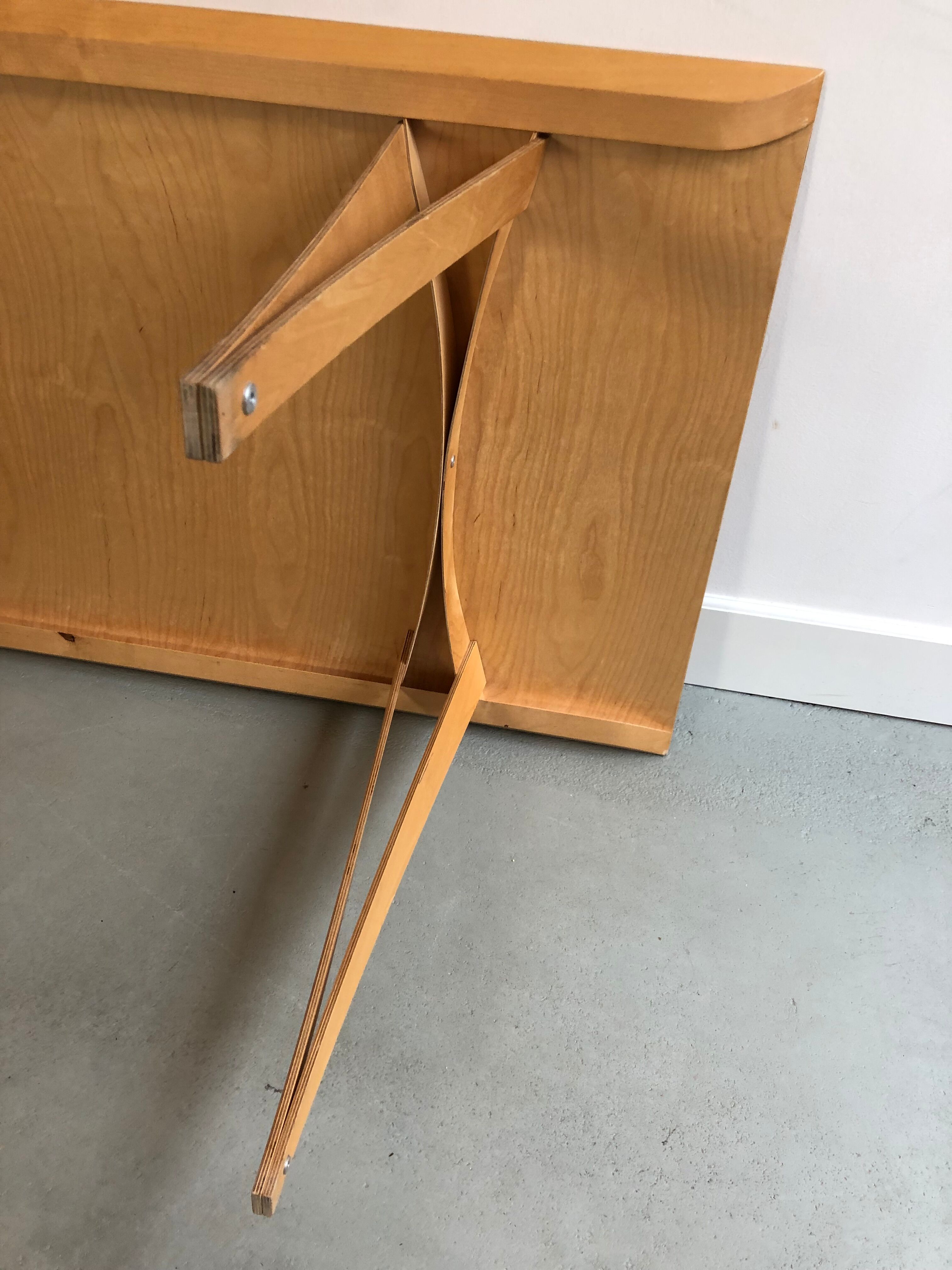Dining table spanoto design Nils Holger for Moormann
