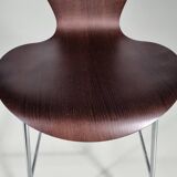 Set of 4 brown oak plywood bar stools by Fritz Hansen Series 7 by Arne Jacobsen.