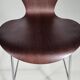 Set of 4 brown oak plywood bar stools by Fritz Hansen Series 7 by Arne Jacobsen.
