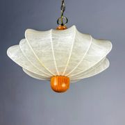 1960s Italian cocoon suspension, made of resin and pine wood.