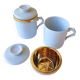 2 white and gold Limoges porcelain tea cups