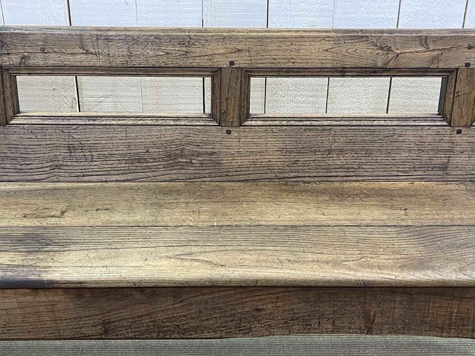 Rustic chestnut bench from the late 19th century.