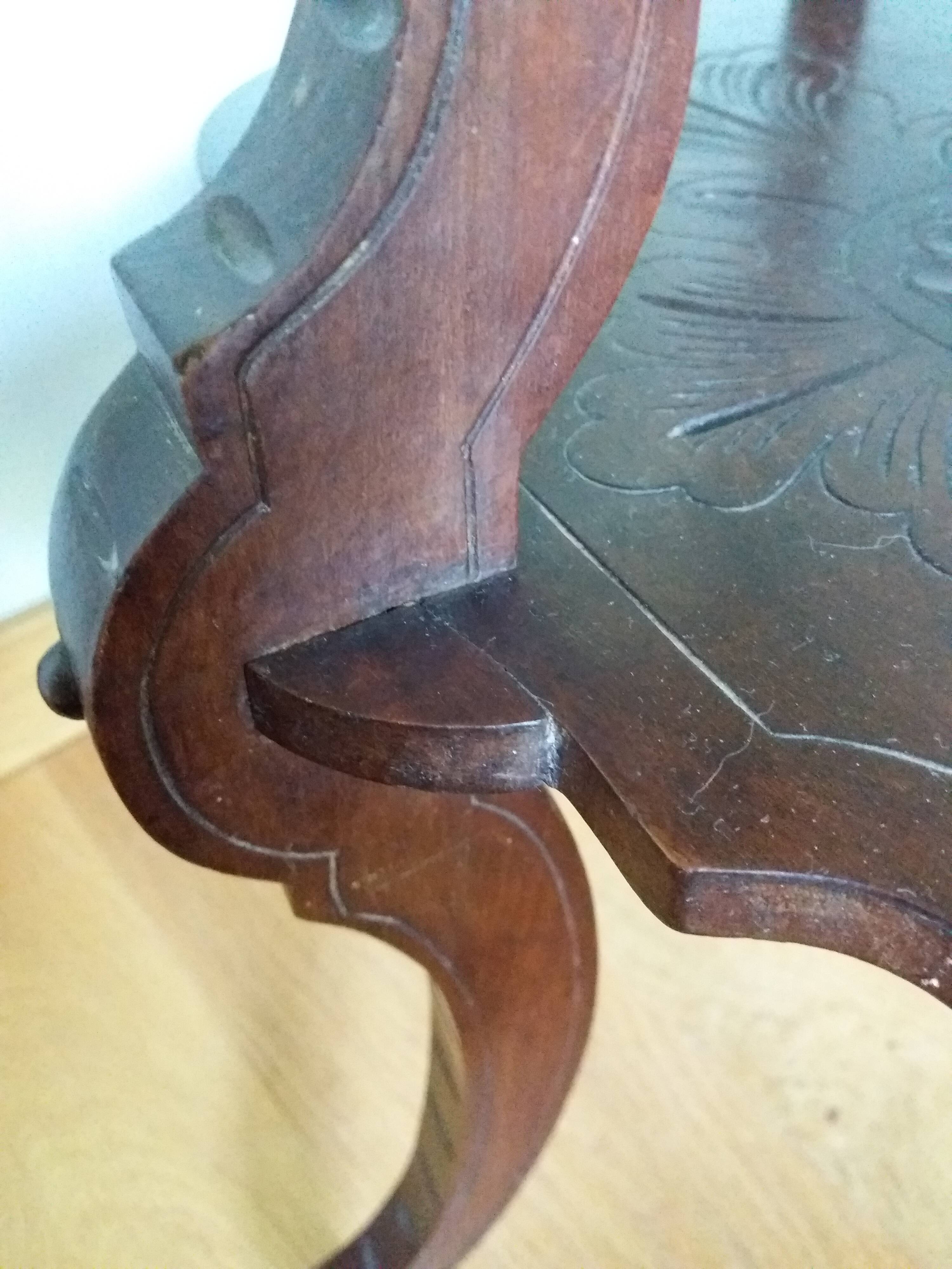 Triplet console harness in carved wood