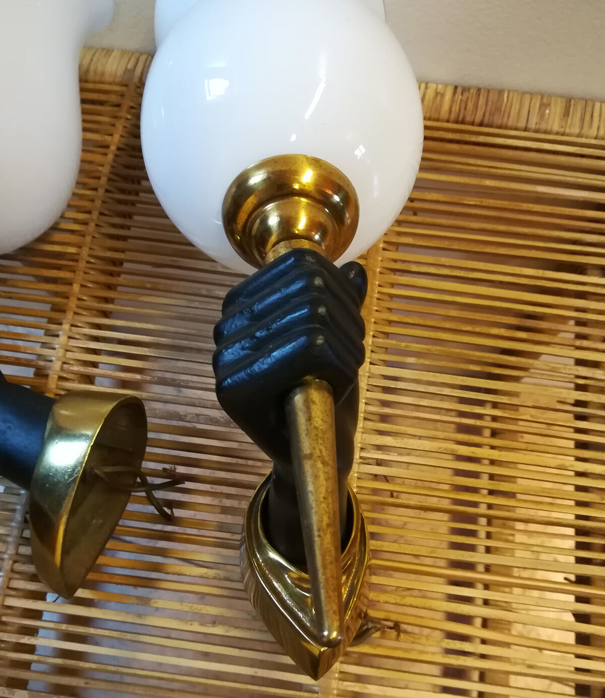 Pair of sconces in hands of Nubian by John Dévoluy