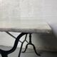 Set of two bistro tables in marble and wrought iron