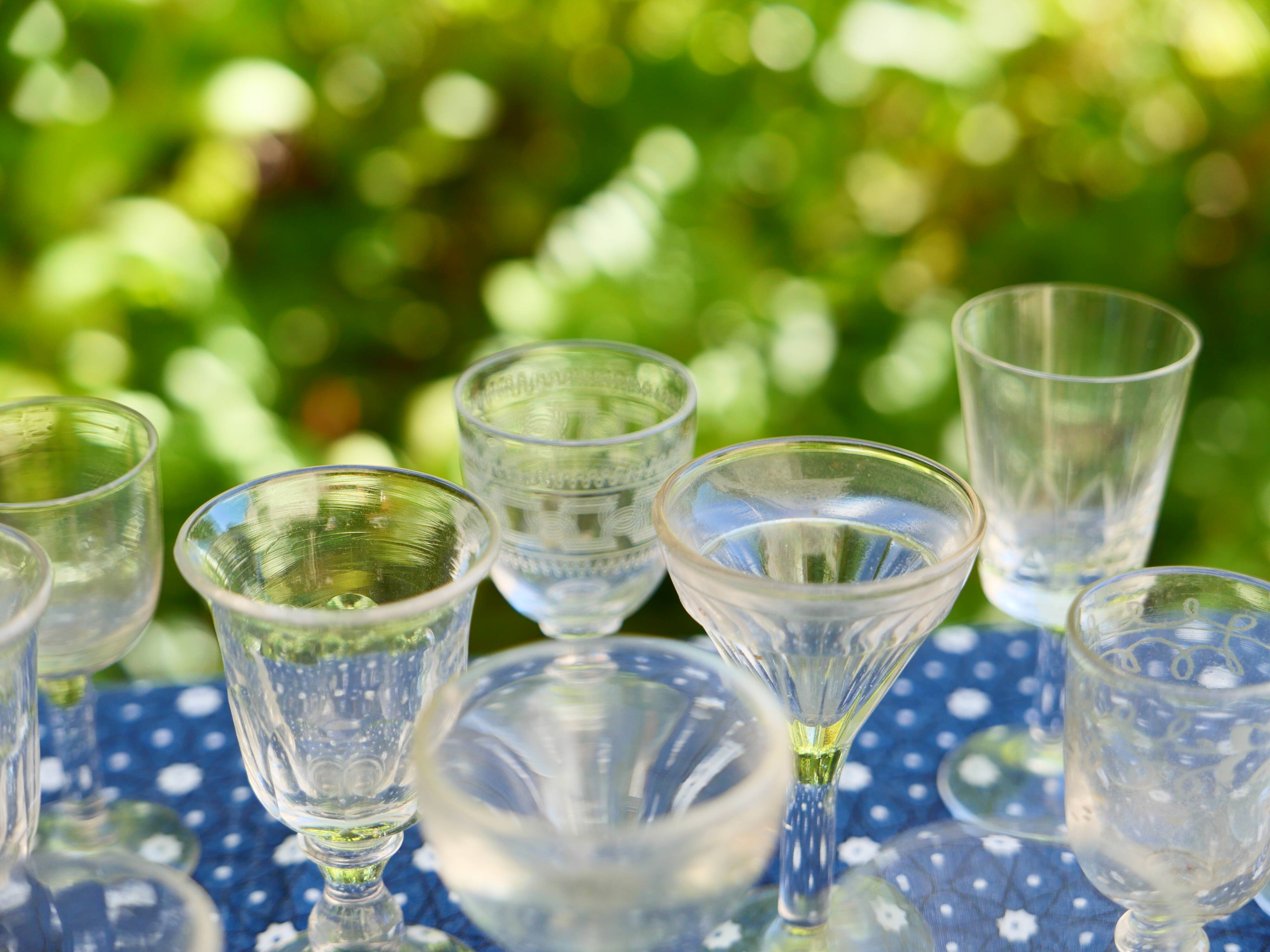 Assortment of 15 mismatched vintage liqueur glasses