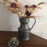 Stamped pewter pitcher