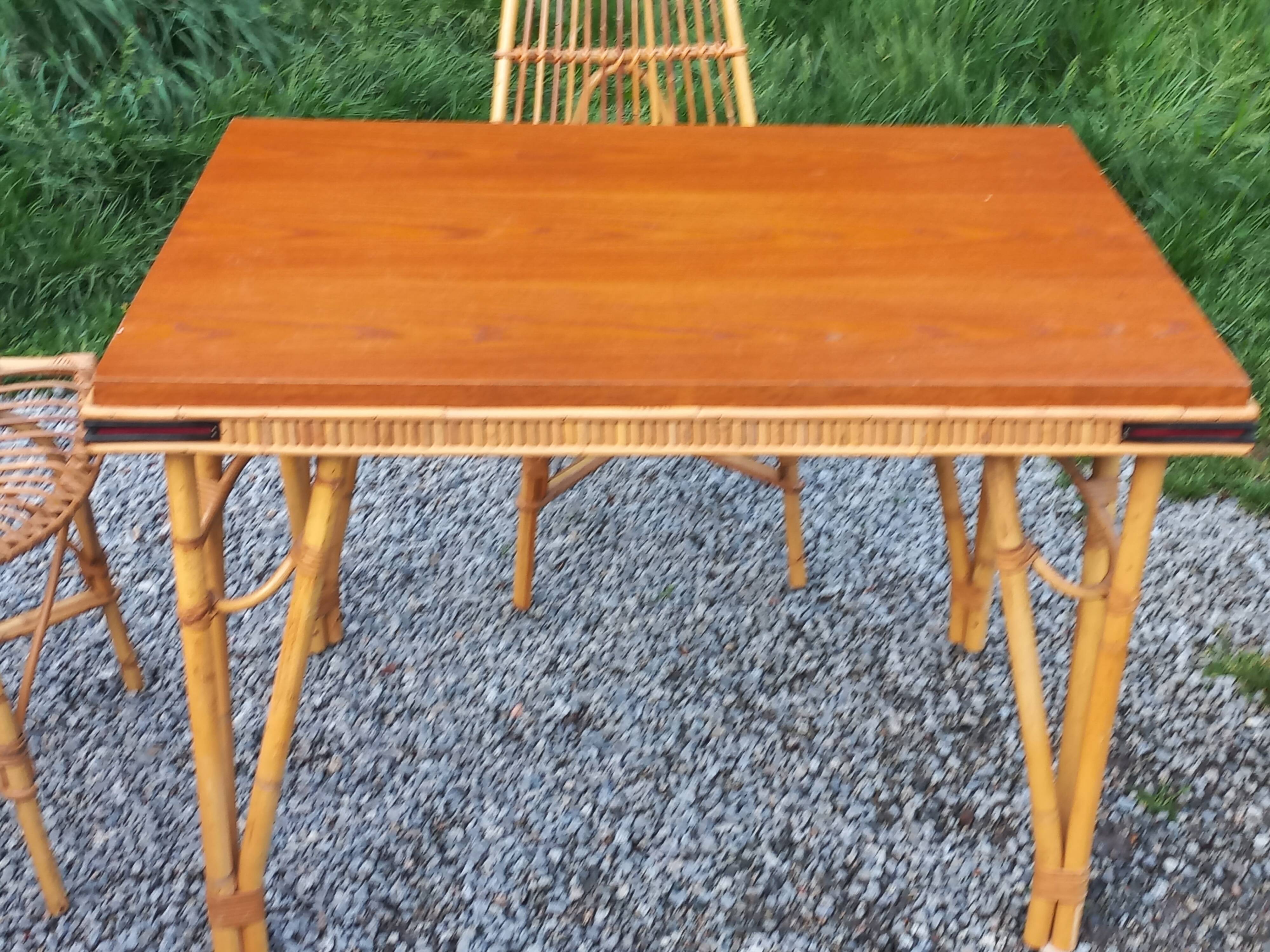 1 Table 1 fauteuil 3 chaises en bambou et rotin attribués à Audoux et Minet