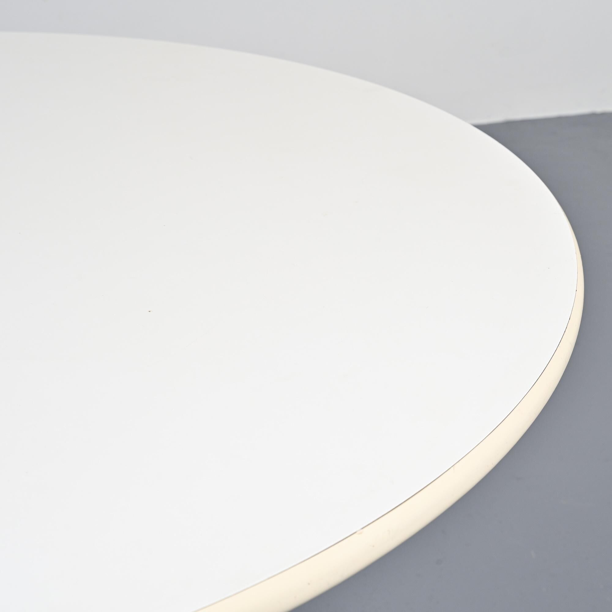 Round table by Charles and Ray Eames for Herman Miller, circa 1970.