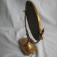 Rotating mirror in psychedelic brass