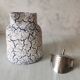 Cracked and enamelled ceramic teapot