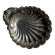 Large antique silver-plated bowl in the shape of a shell.