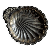Large antique silver-plated bowl in the shape of a shell.
