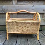 Old rattan magazine rack