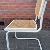 Cesca dining room chair designed by Marcel Breuer