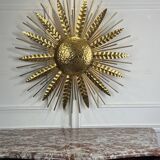 Large golden hammered metal sun wall light with a diameter of 90 cm from the year
