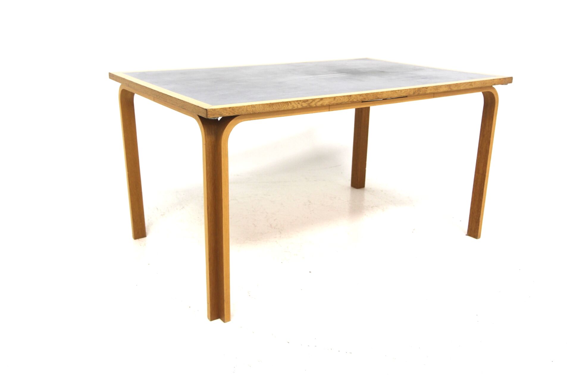 Scandinavian beech dining table, Magnus Olesen, Denmark, 1960.
