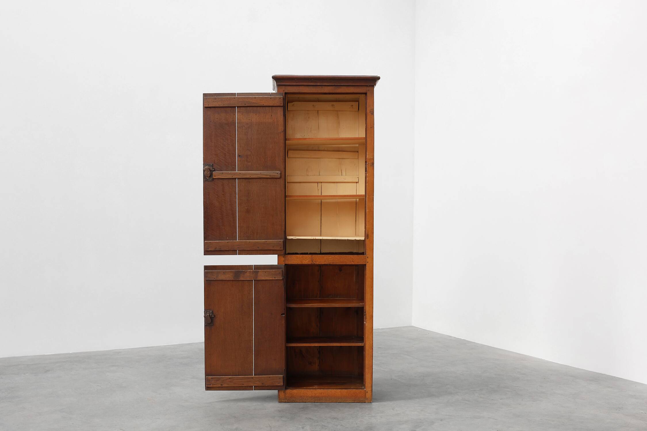 Tall rustic French monastery wardrobe in oak from the late 19th century