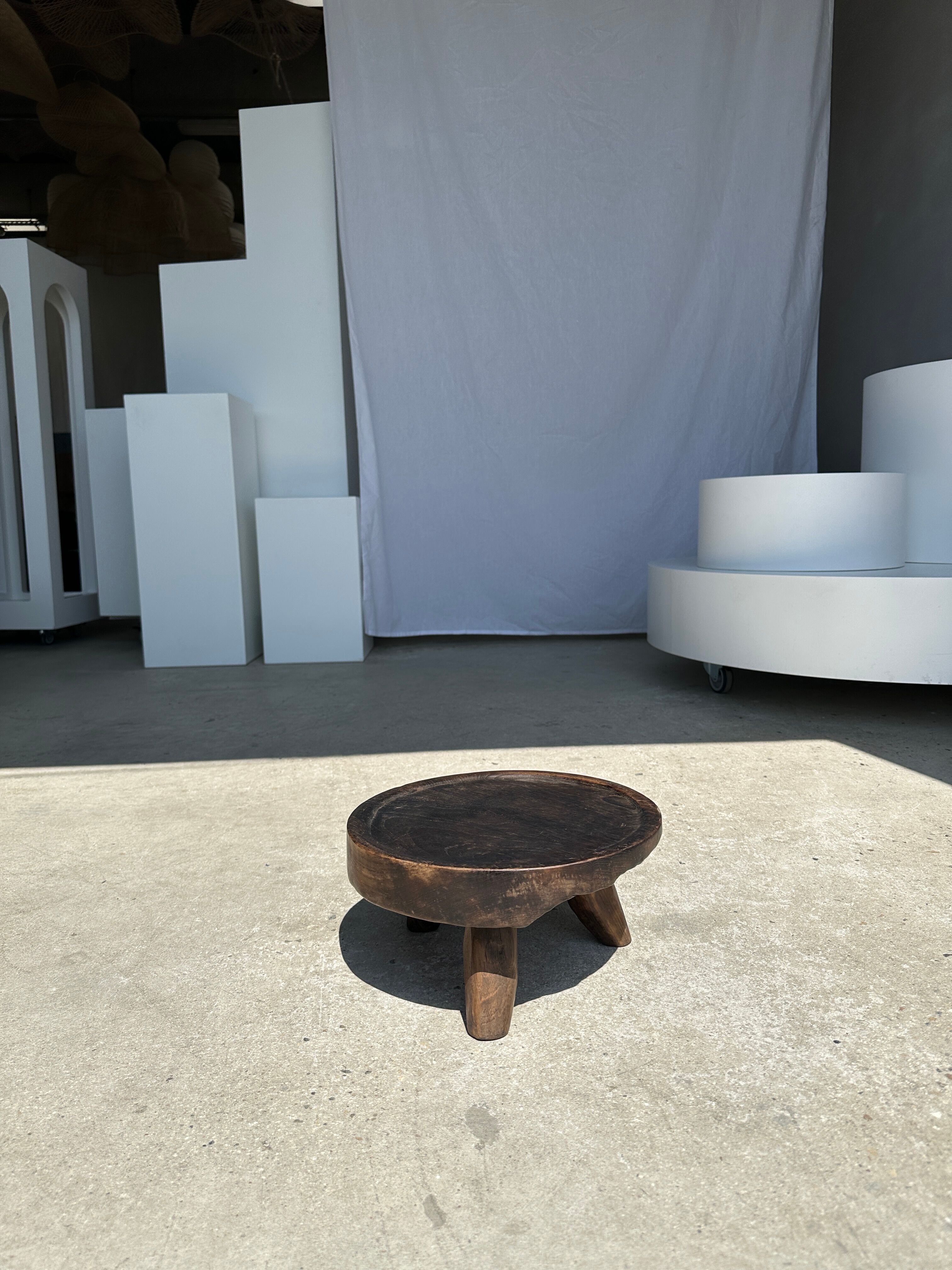 Small tripod stool low in dark brown upcycled teak