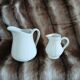 2 antique pitchers in white earthenware