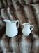 2 antique pitchers in white earthenware