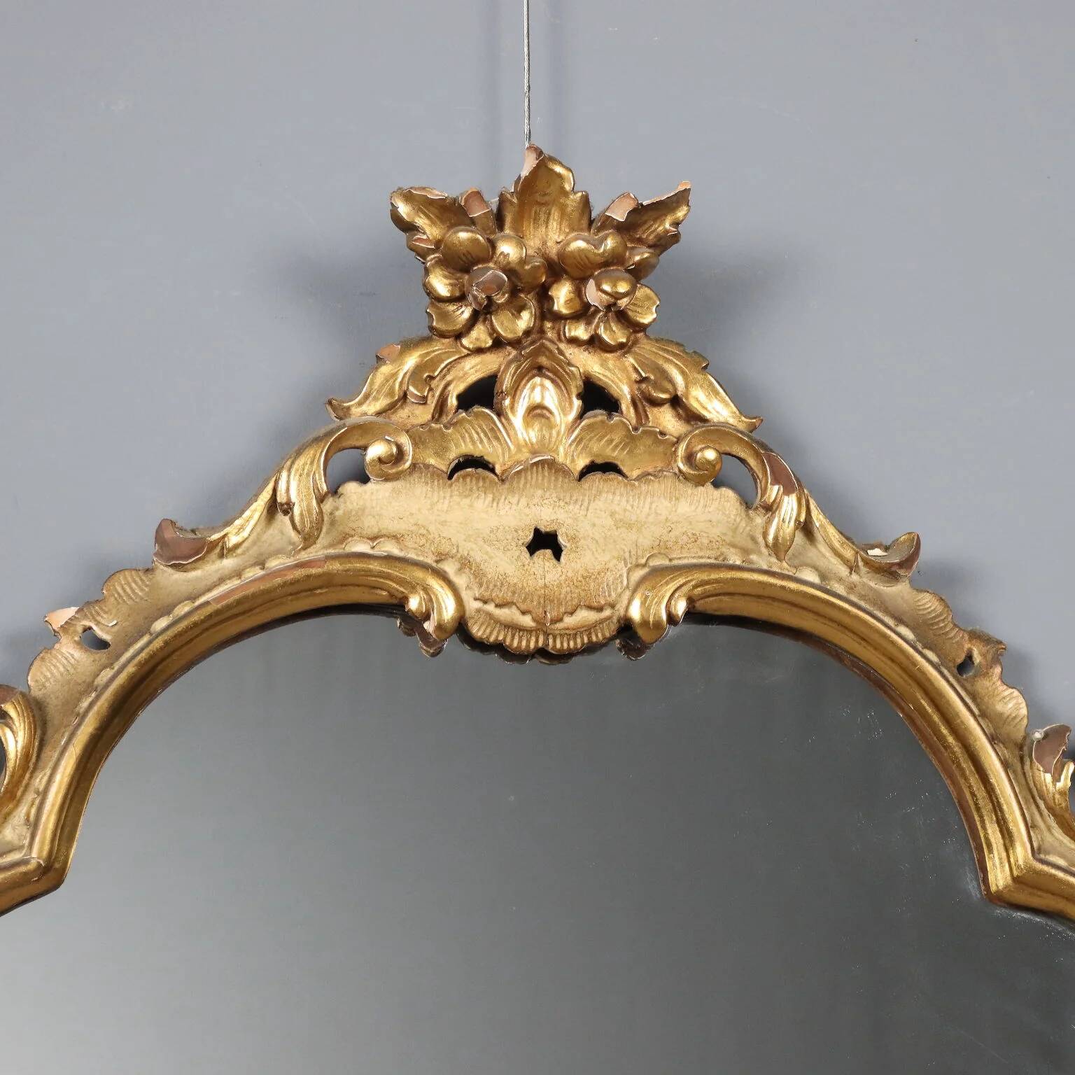 Antique baroque-style mirror in carved wood, Italy, 19th century.