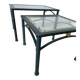 2 nesting tables from the 1960s in metal and bevelled glass.