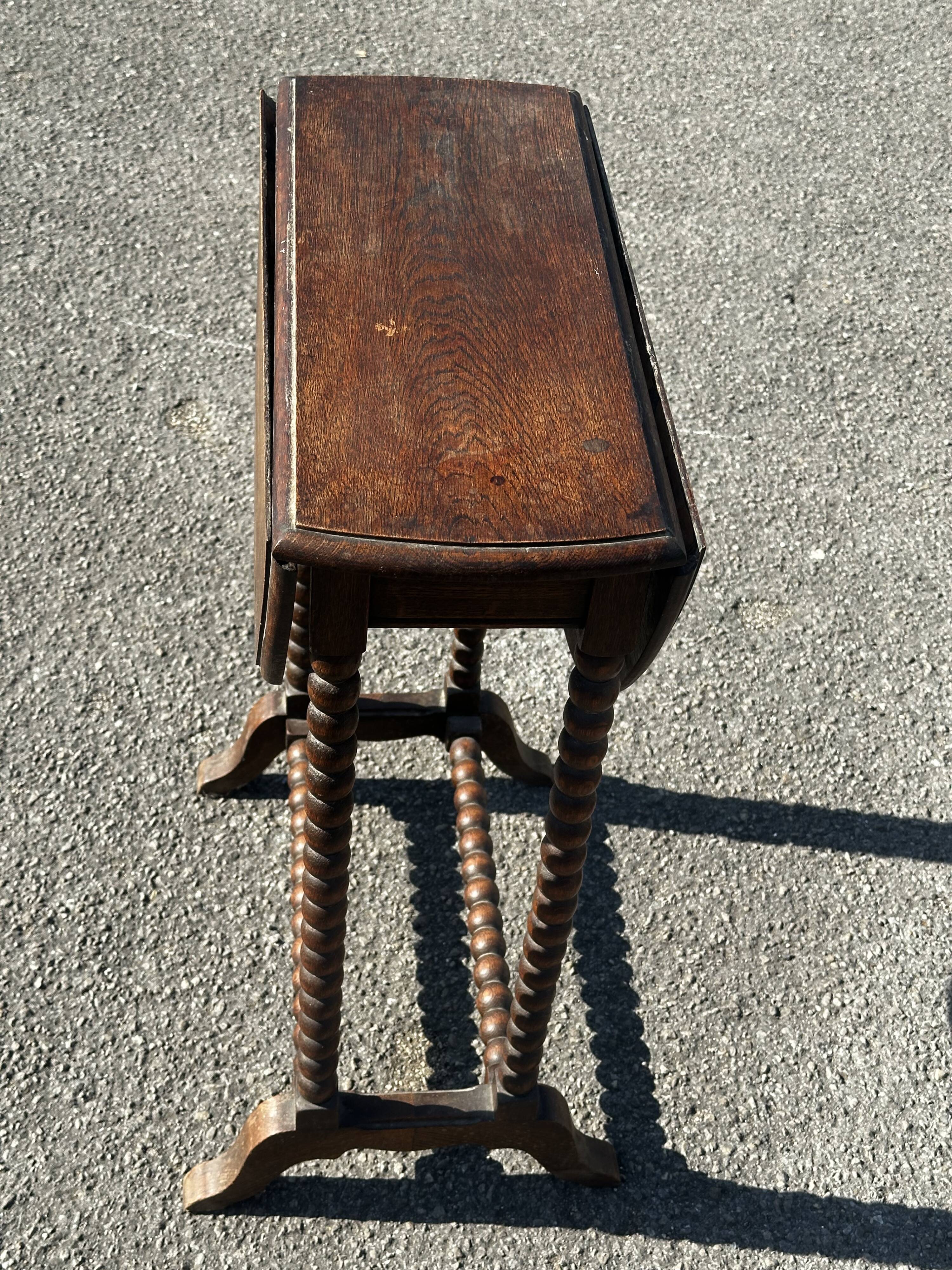 Small folding table called Gateleg, Victorian era