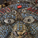 Vintage ritual mask in repoussé brass from Nepal/Tibet.