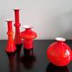 Arrangement of 4 red glass 'Carnaby' vases by Per Lütken for Holmegaard, Denmark 1960's