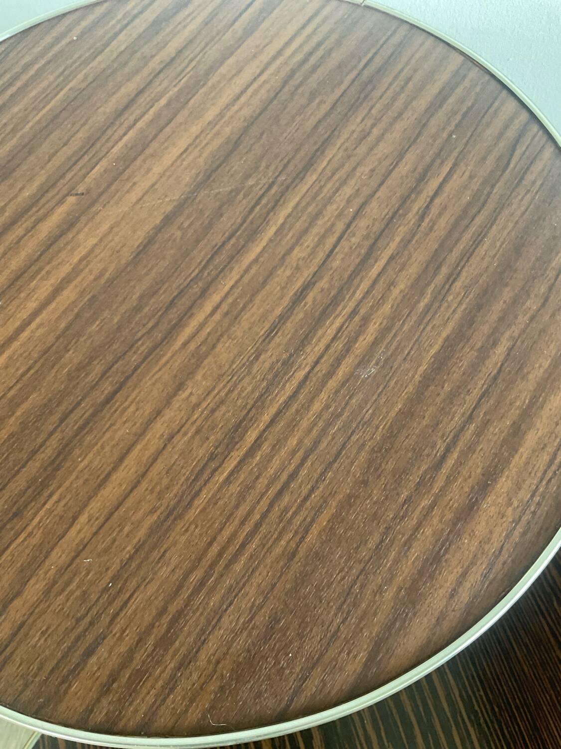 Trio of tripod side tables, 1960s-70s