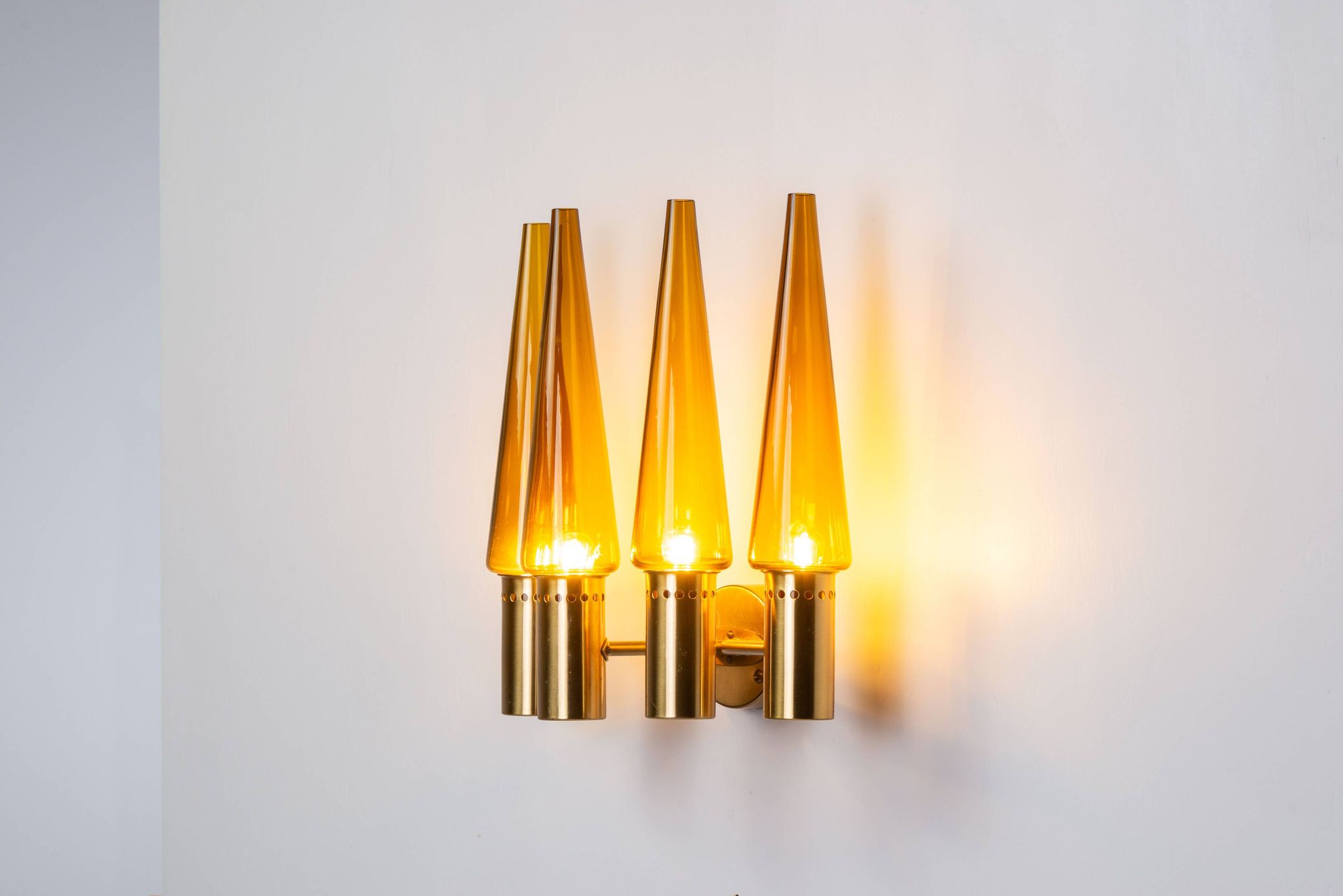 Hans Agne Jakobsson wall lamp made from brass with orange shades