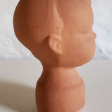 Terracotta pot cover baby head