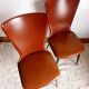 Pair of vintage vinyl chairs with splayed legs