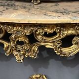 Mirror set with baroque style gilded wood console on marble top.